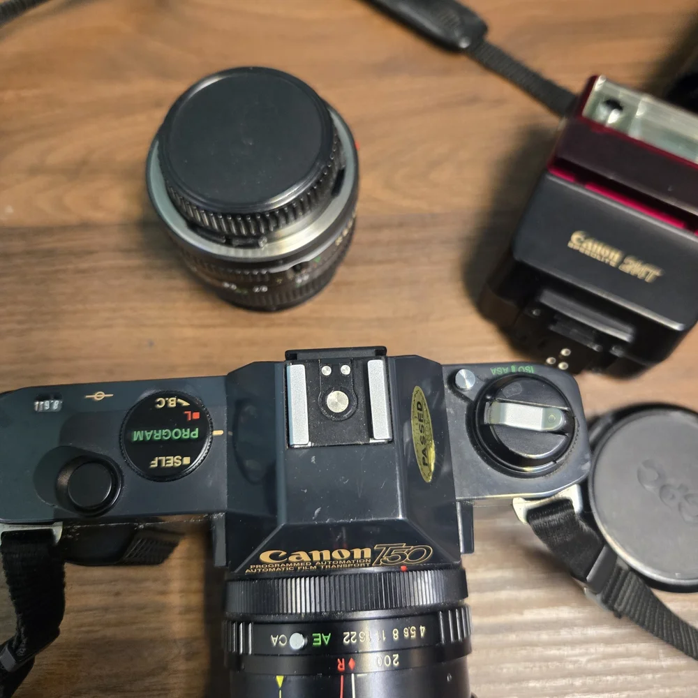 Canon Black SLR Camera with Textured Zoom Lens